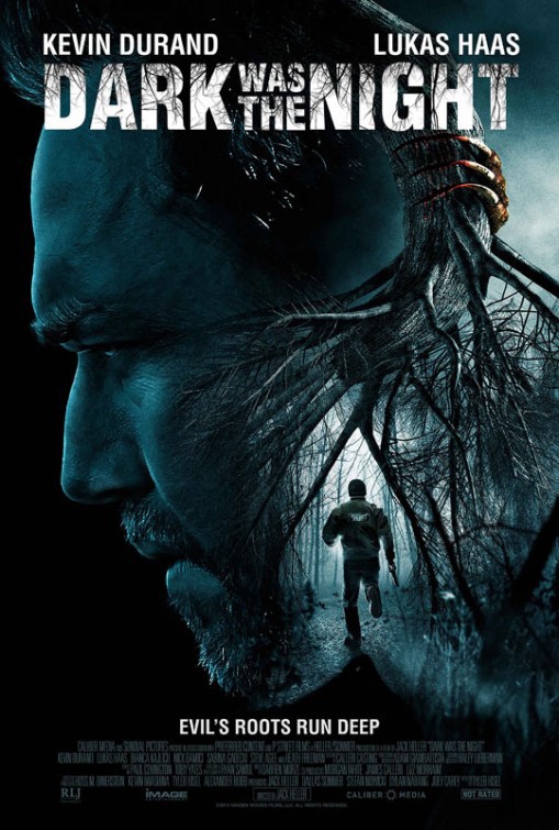 Dark Was the Night film poster, it shows the face of the main character on the left, the roots of a tree on the right and a man running underneath