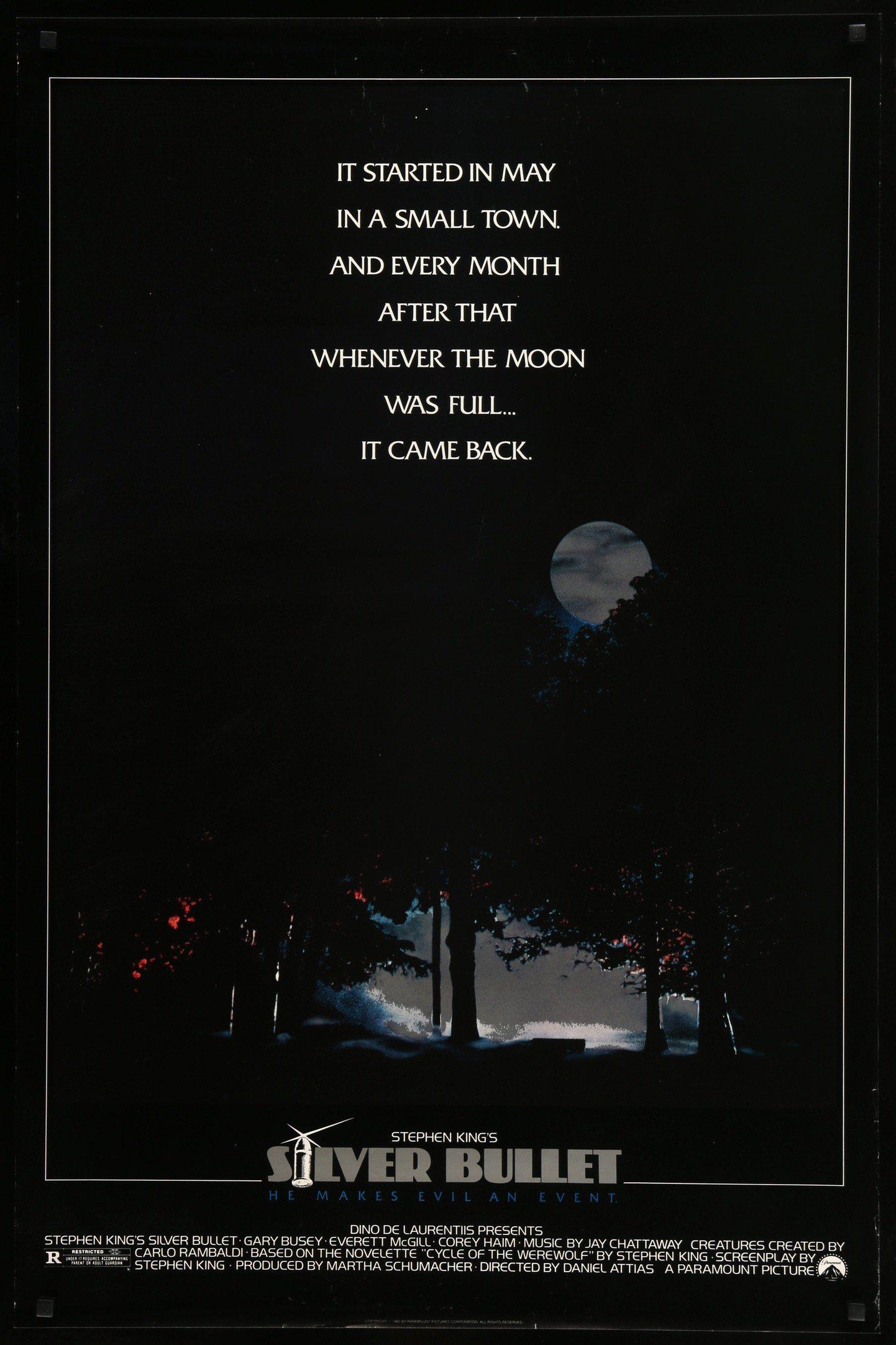 Silver Bullet film poster, it shows a vague wooded area with a full moon shining through the trees